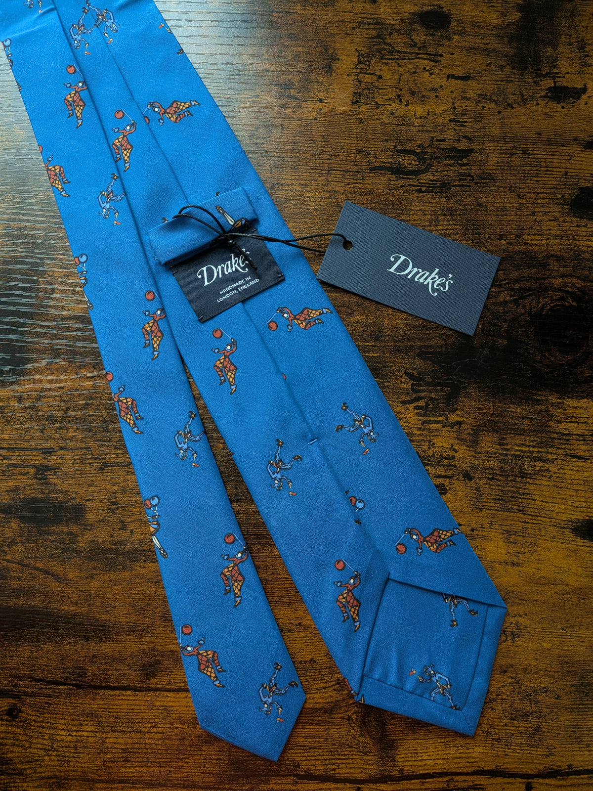 Drake's blue jesters circus handmade tipped silk tie circus detail view 3