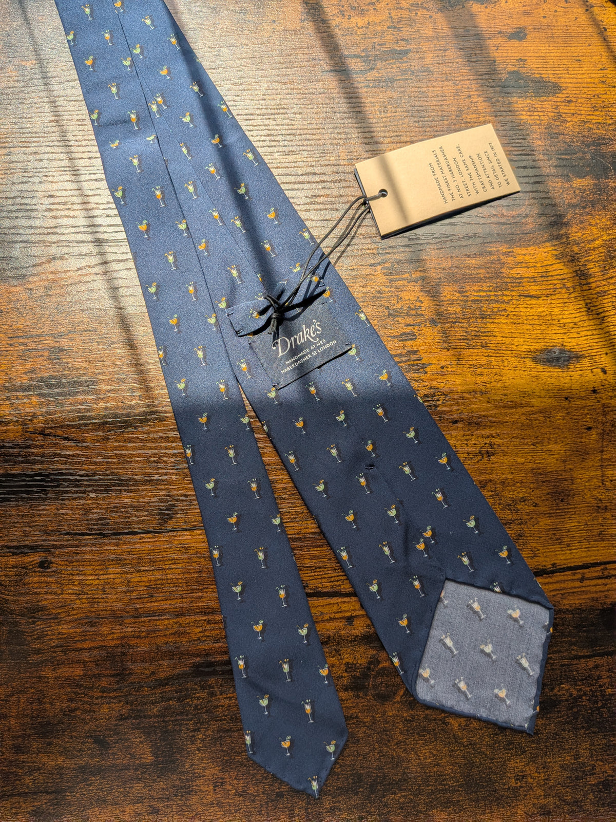 Drake's cocktail blue motif handmade silk tie detail view 3