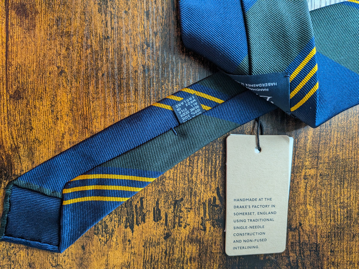 Drake's navy green yellow handmade striped silk tie detail view 2