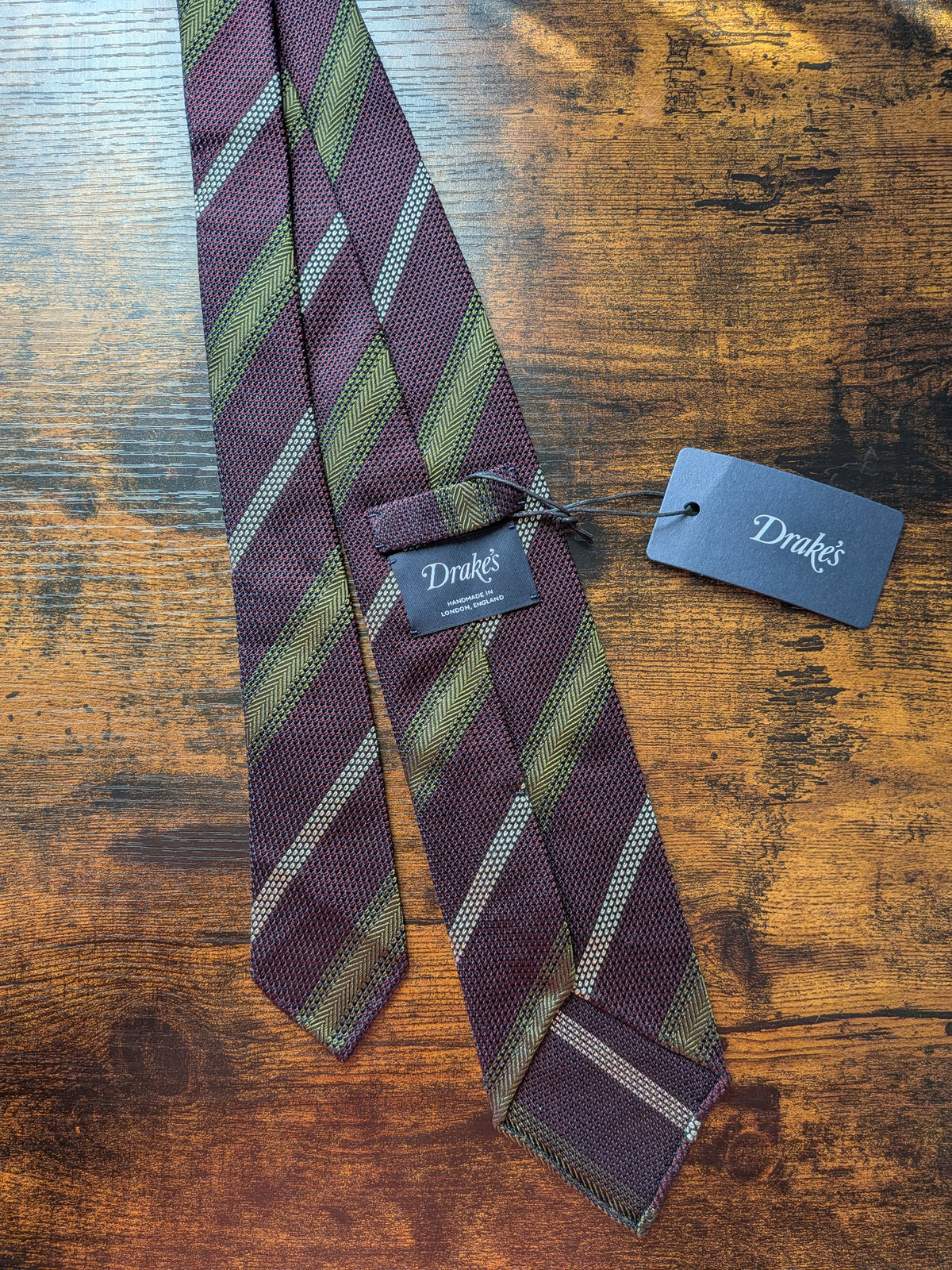Drake's purple mastard white handmade striped silk tie detail view 3