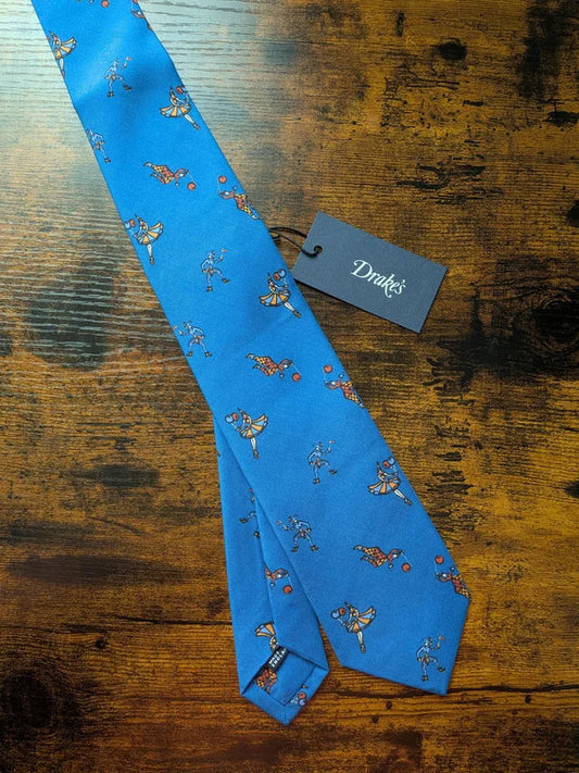 Archive Selection: Drake’s London "Jesters & Circus" Handmade Tipped Silk Tie in Cerulean Blue