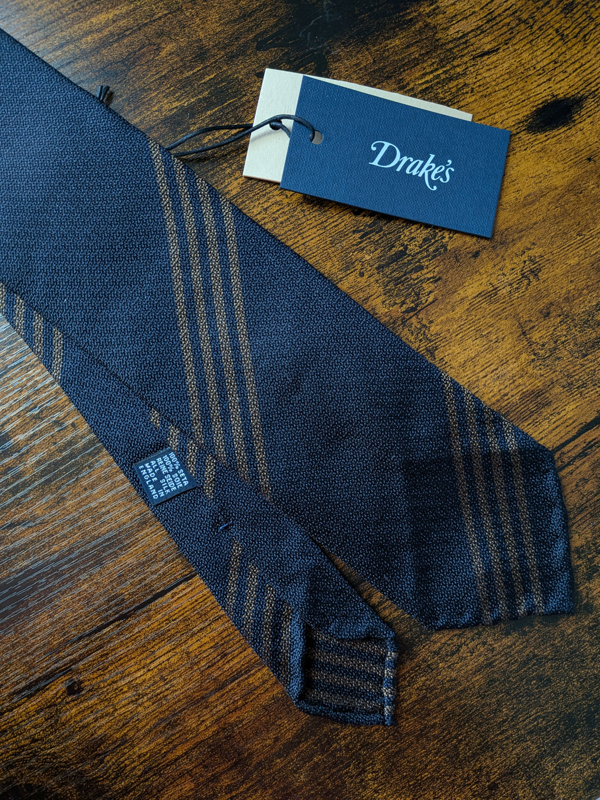 Drake's black brown handmade striped silk tie detail view 2