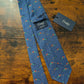 Drake's blue curling motif handmade tipped silk tie detail view 2