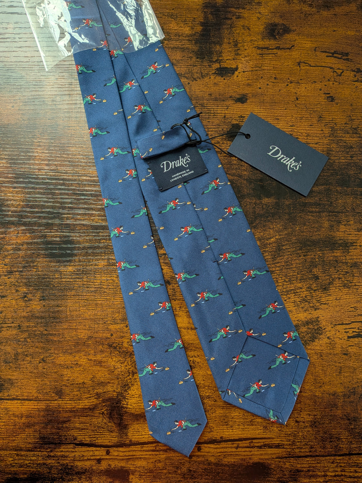 Drake's blue curling motif handmade tipped silk tie detail view 2