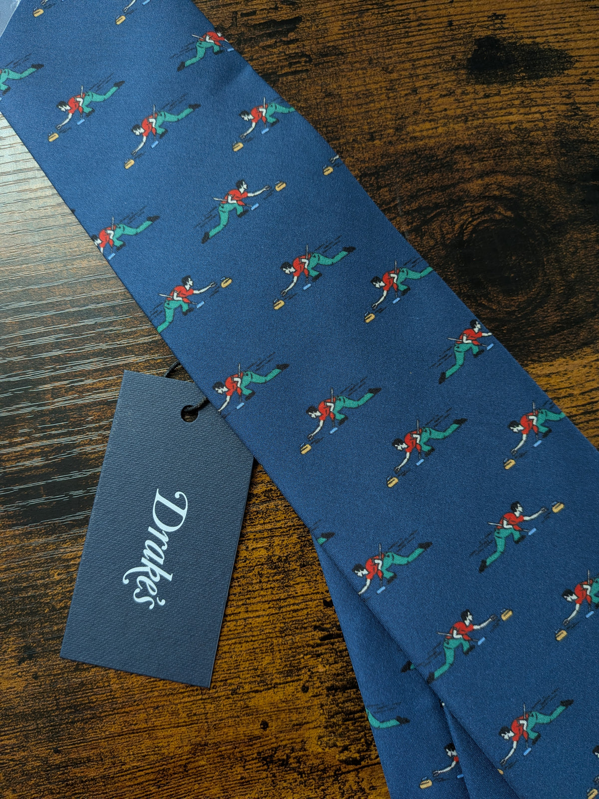 Drake's blue curling motif handmade tipped silk tie detail view 3