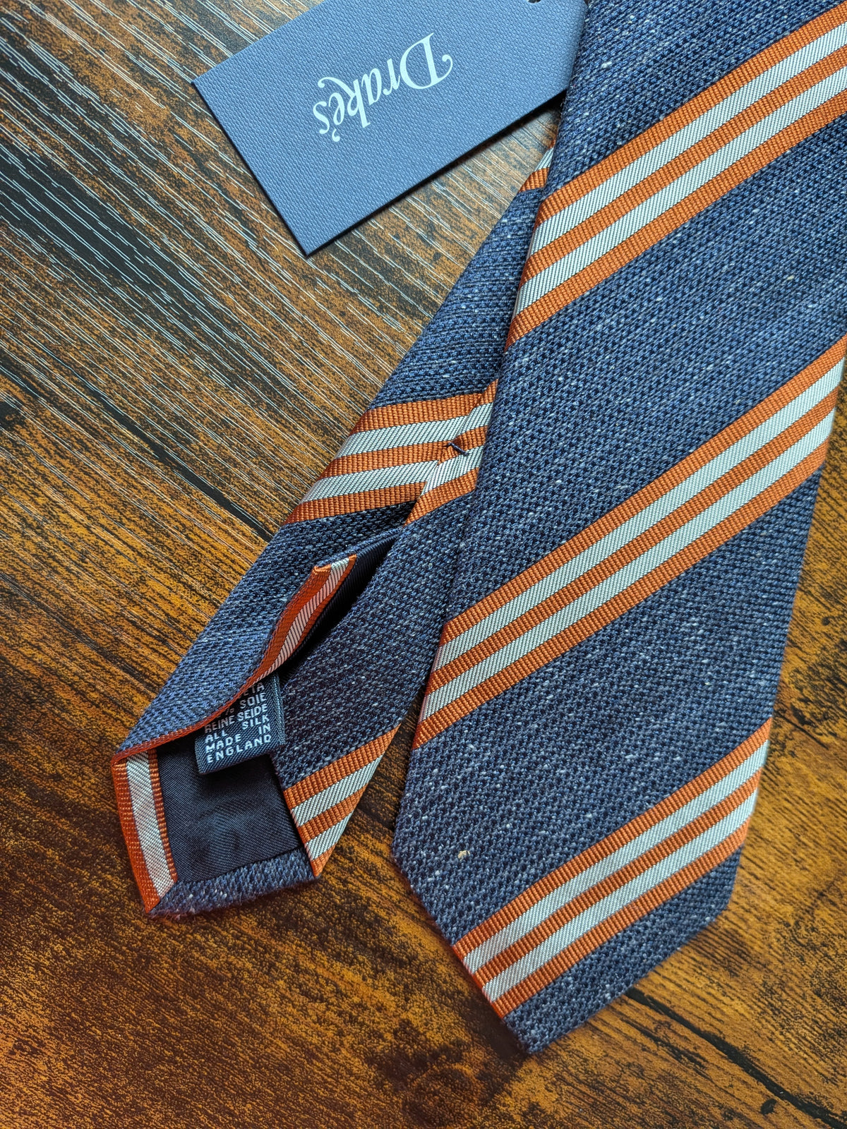 Drake's blue orange ecru handmade striped silk tie detail view 2