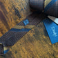 Drake's brown navy yellow handmade striped silk tie detail view 2