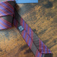 Drake's brown red blue handmade striped silk tie detail view 2