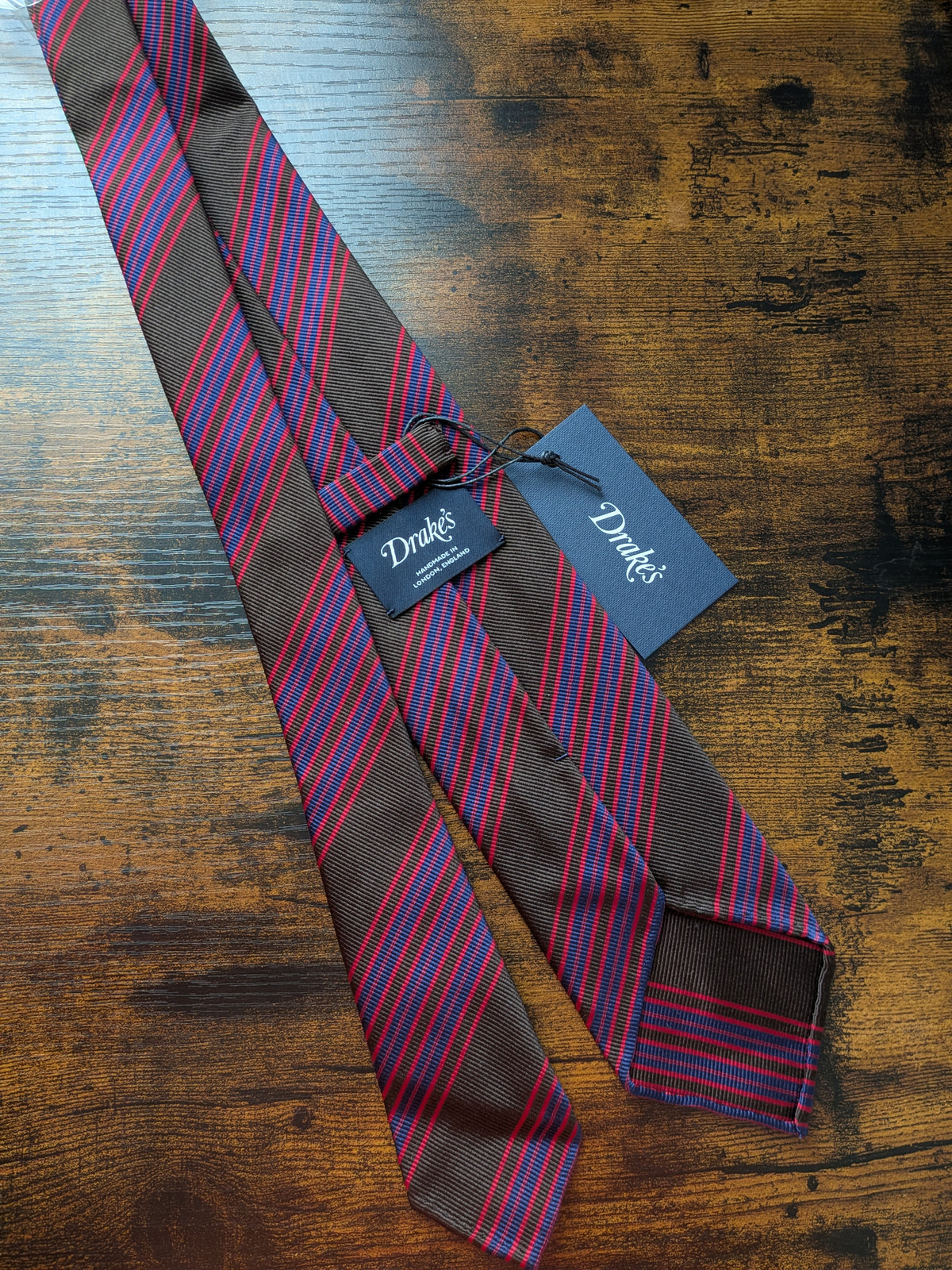 Drake's brown red blue handmade striped silk tie detail view 3