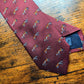 Drake's burgundy fox motif handmade silk tie detail view 3