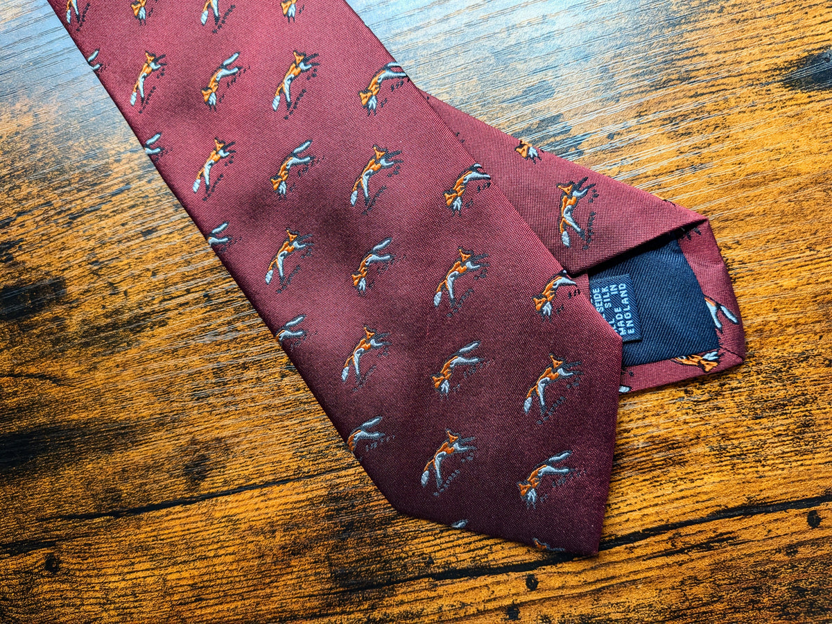 Drake's burgundy fox motif handmade silk tie detail view 3
