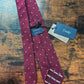 Drake's burgundy handmade polka dot hand rolled silk tie detail view 3