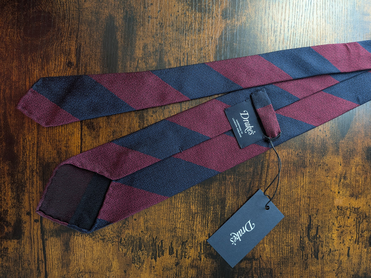 Drake's burgundy navy striped handmade silk tie detail view 3