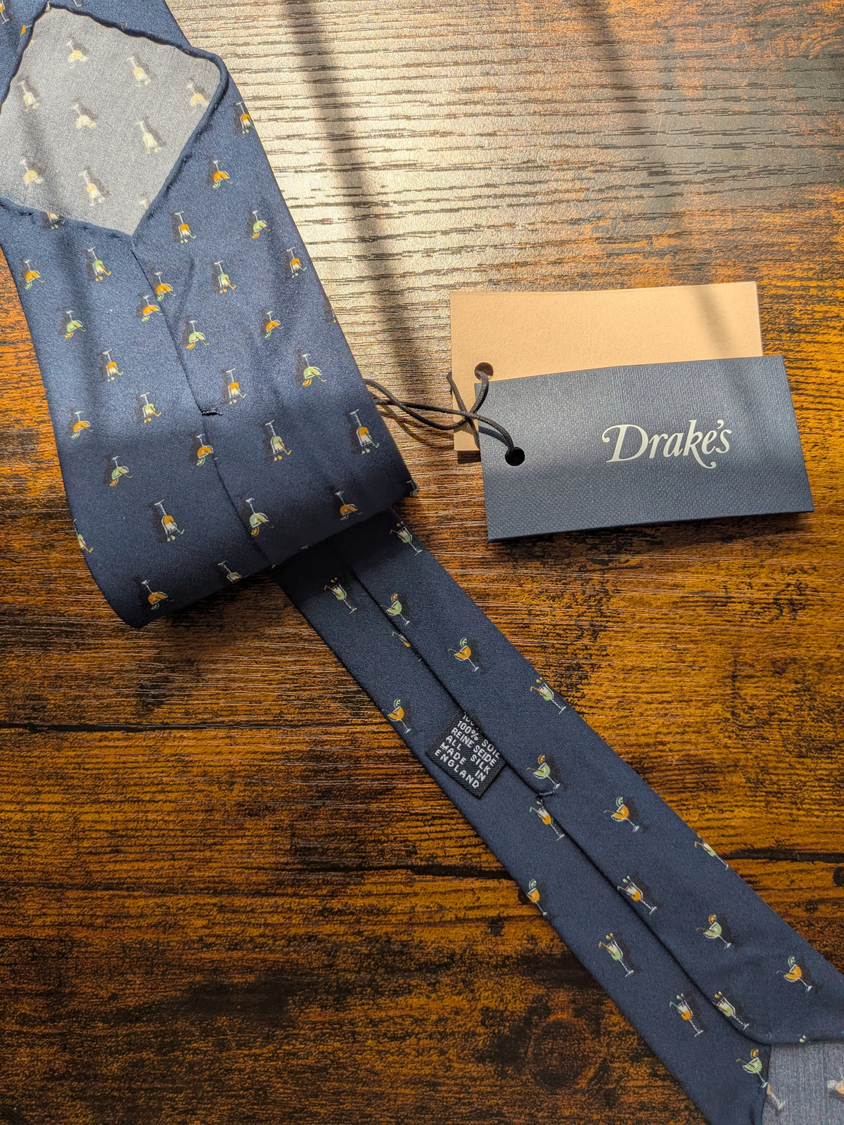 Drake's cocktail blue motif handmade silk tie detail view 2