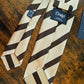 Drake's cream brown block striped handmade silk tie detail view 2