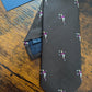 Drake's dark brown football motif handmade tipped silk tie detail view 2