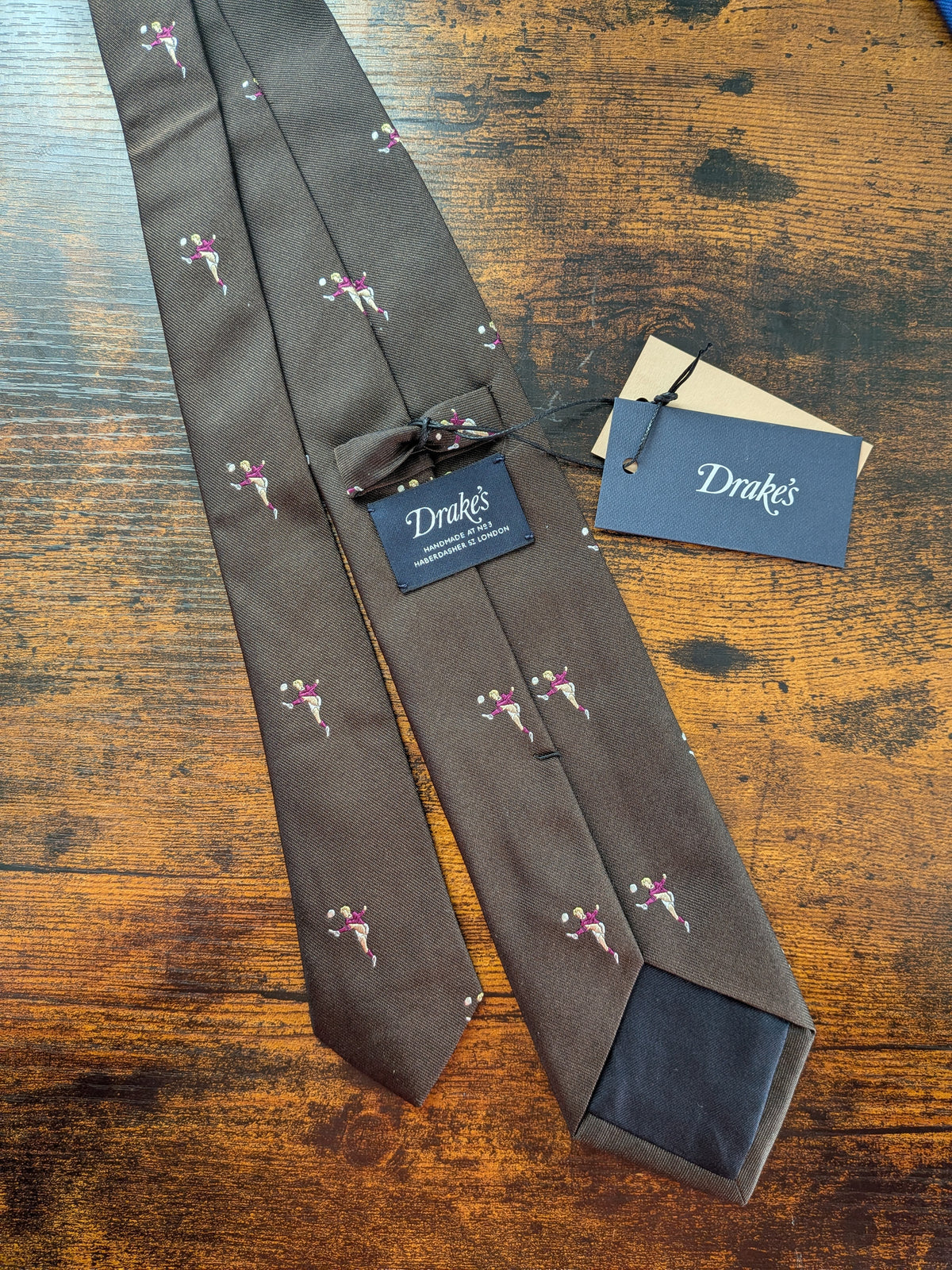 Drake's dark brown football motif handmade tipped silk tie detail view 3