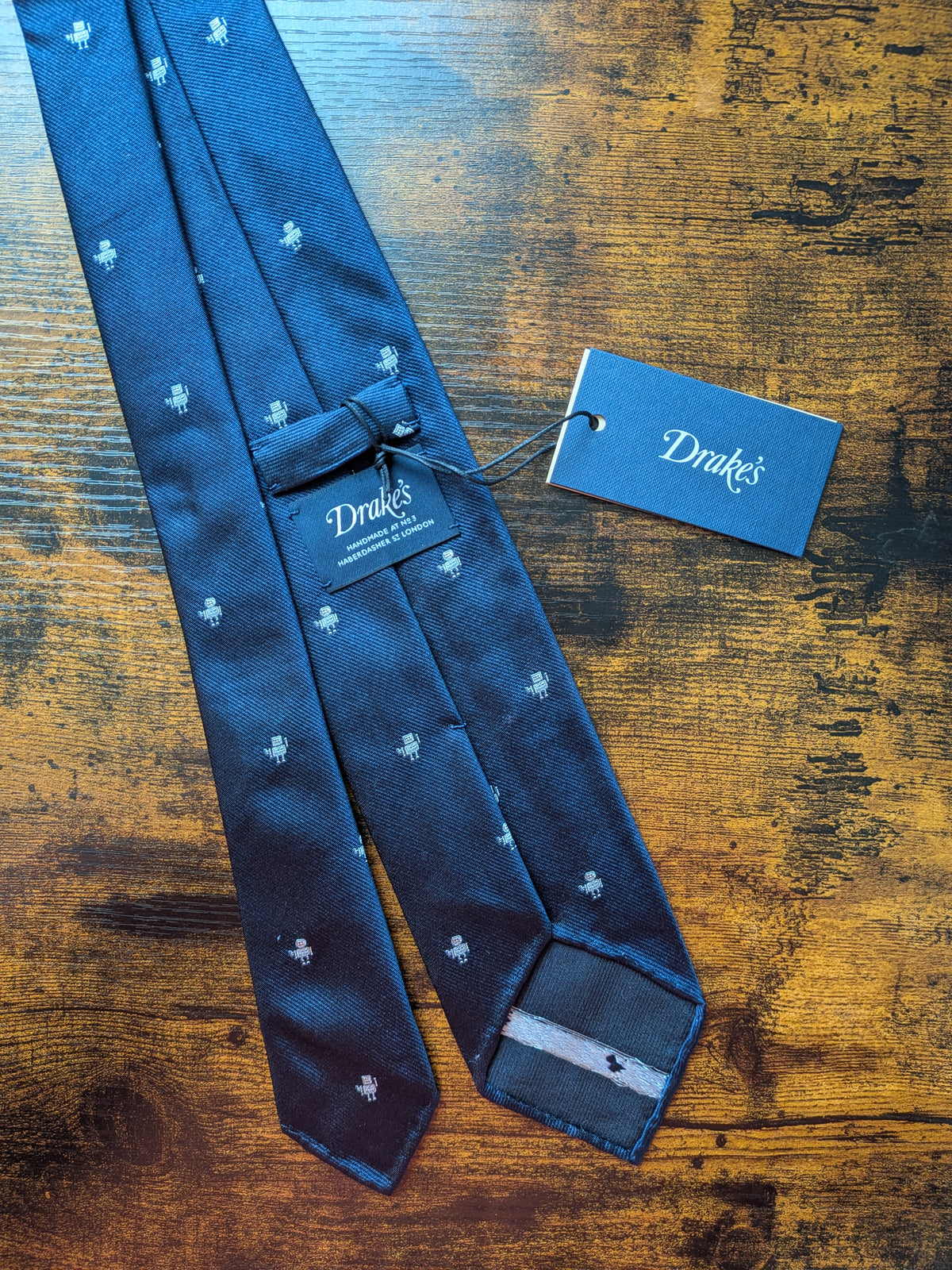 Drake's dark navy robot handmade tipped silk tie robot detail view 3