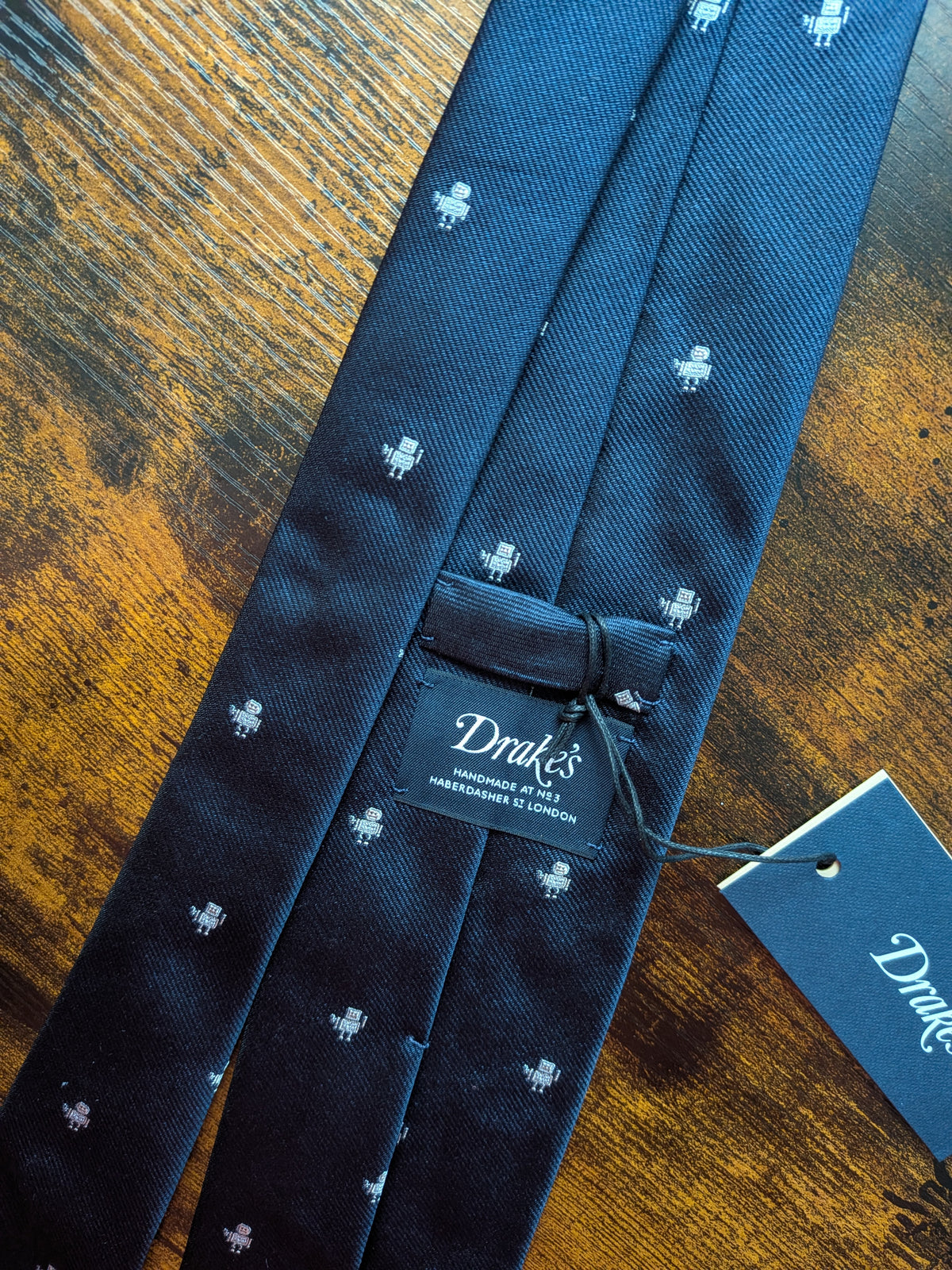 Drake's dark navy robot handmade tipped silk tie robot detail view 4