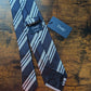 Drake's dark navy white handmade striped silk tie detail view 3