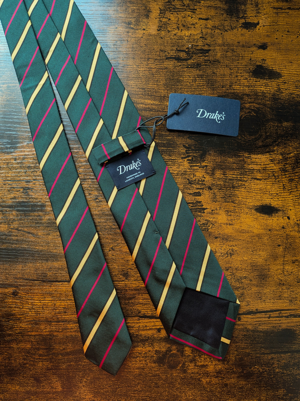 Drake's green yellow pink handmade striped silk cotton tie detail view 2