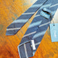 Drake's grenadine navy blue handmade striped silk tie detail view 3