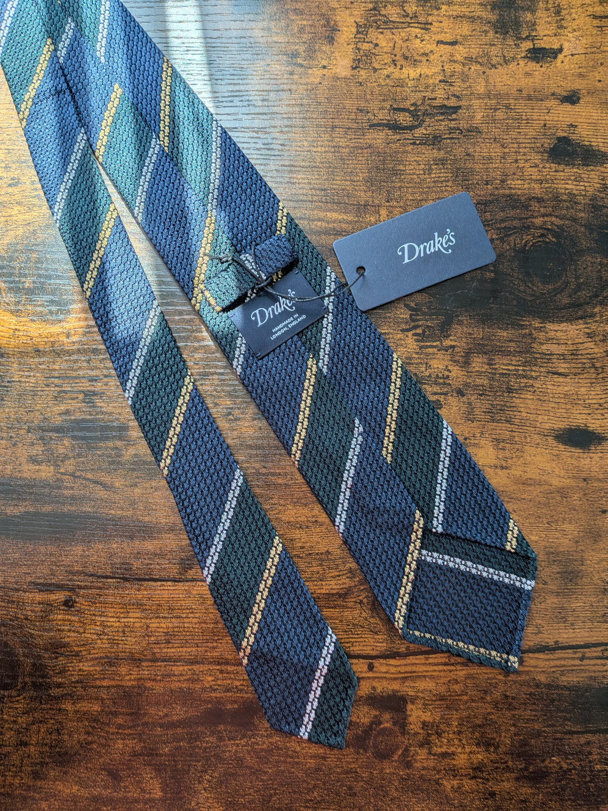 Drake's grenadine navy green yellow multicoloured striped handmade silk tie detail view 3