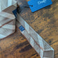 Drake's light brown handmade striped silk tie detail view 3
