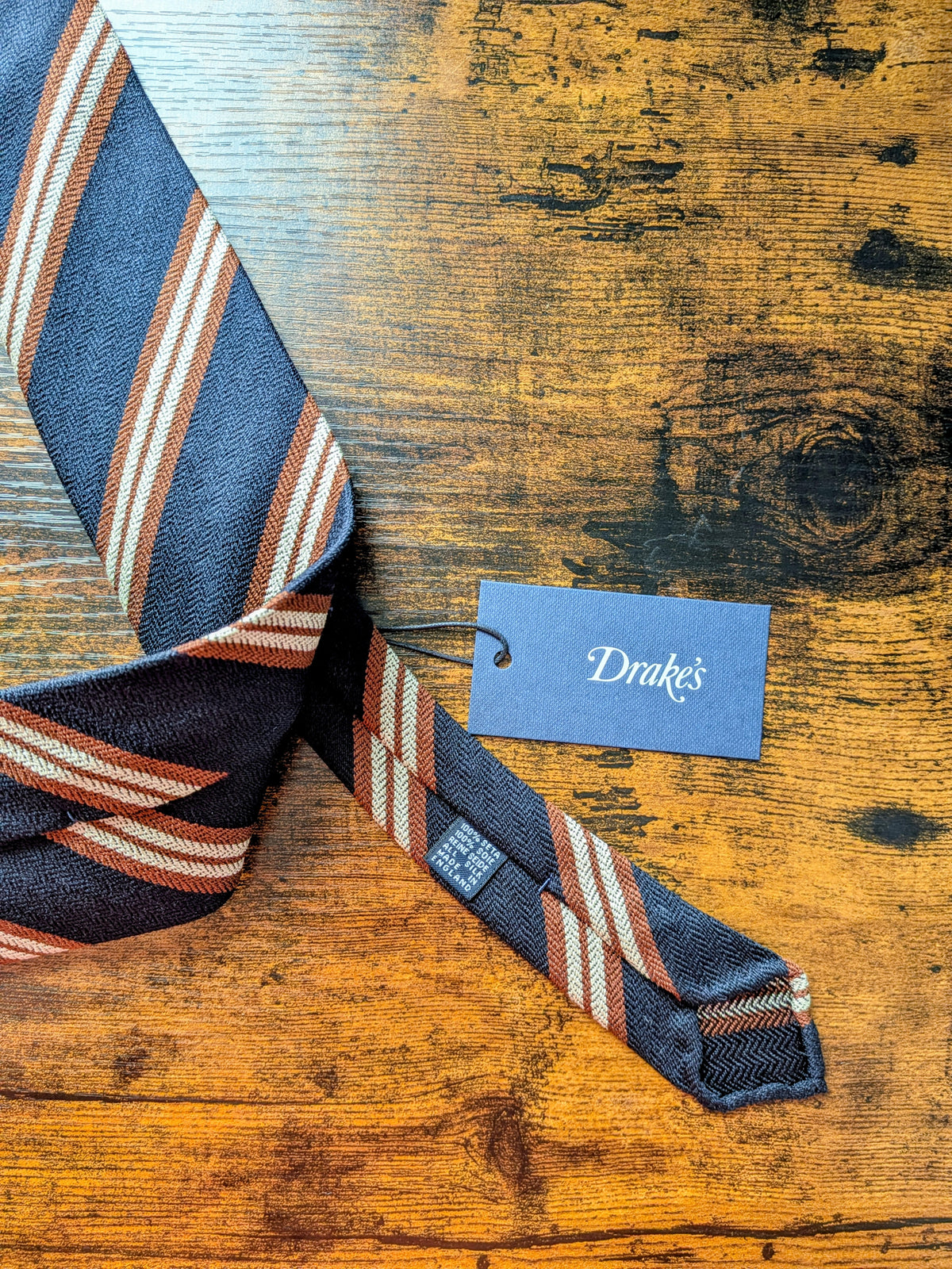 Drake's navy brown white handmade striped silk tie detail view 2