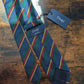 Drake's navy green multicoloured striped handmade silk tie detail view 3