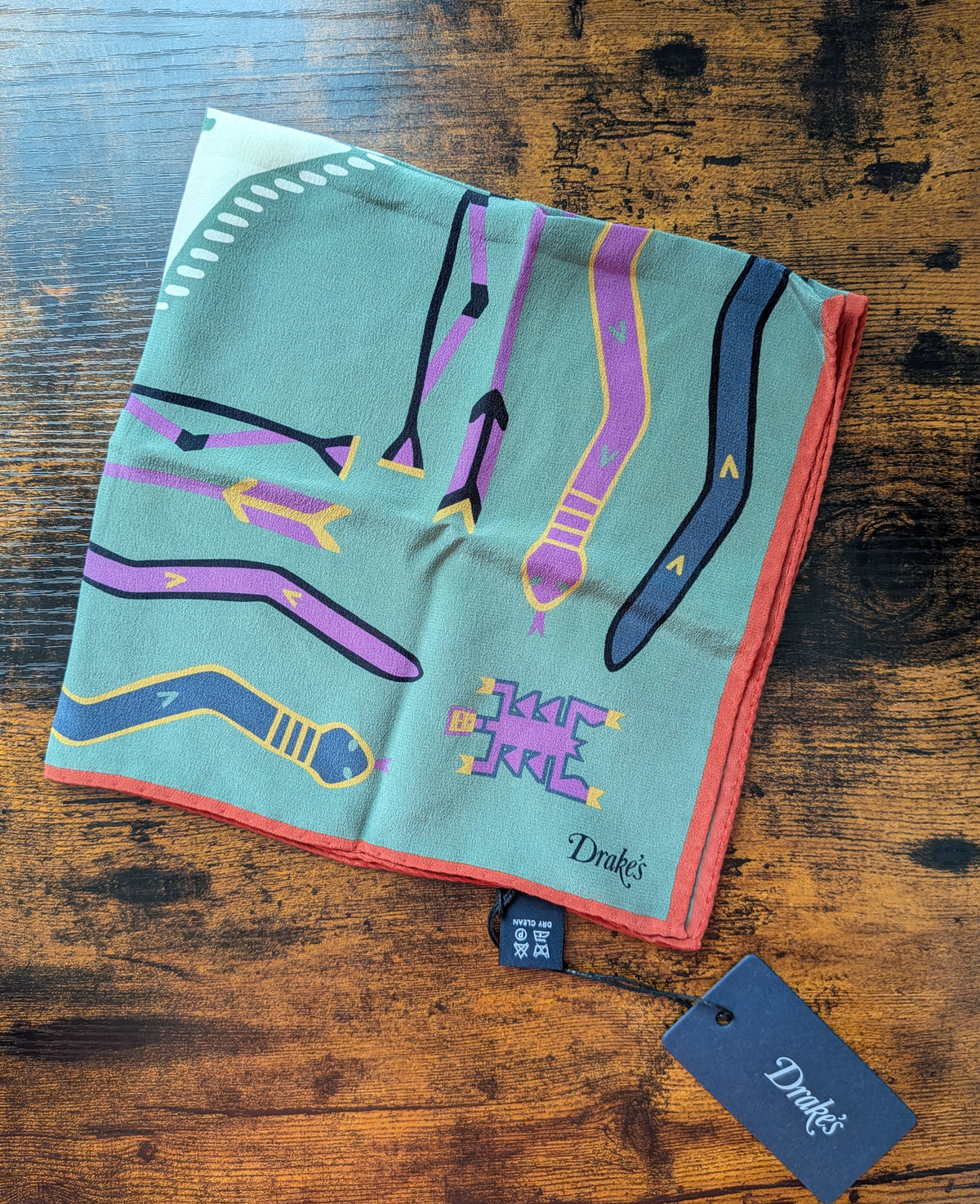 Drake's olive and rust tribal print silk pocket square product image