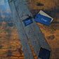 Drake's olive green football sport motif handmade tipped silk tie detail view 2
