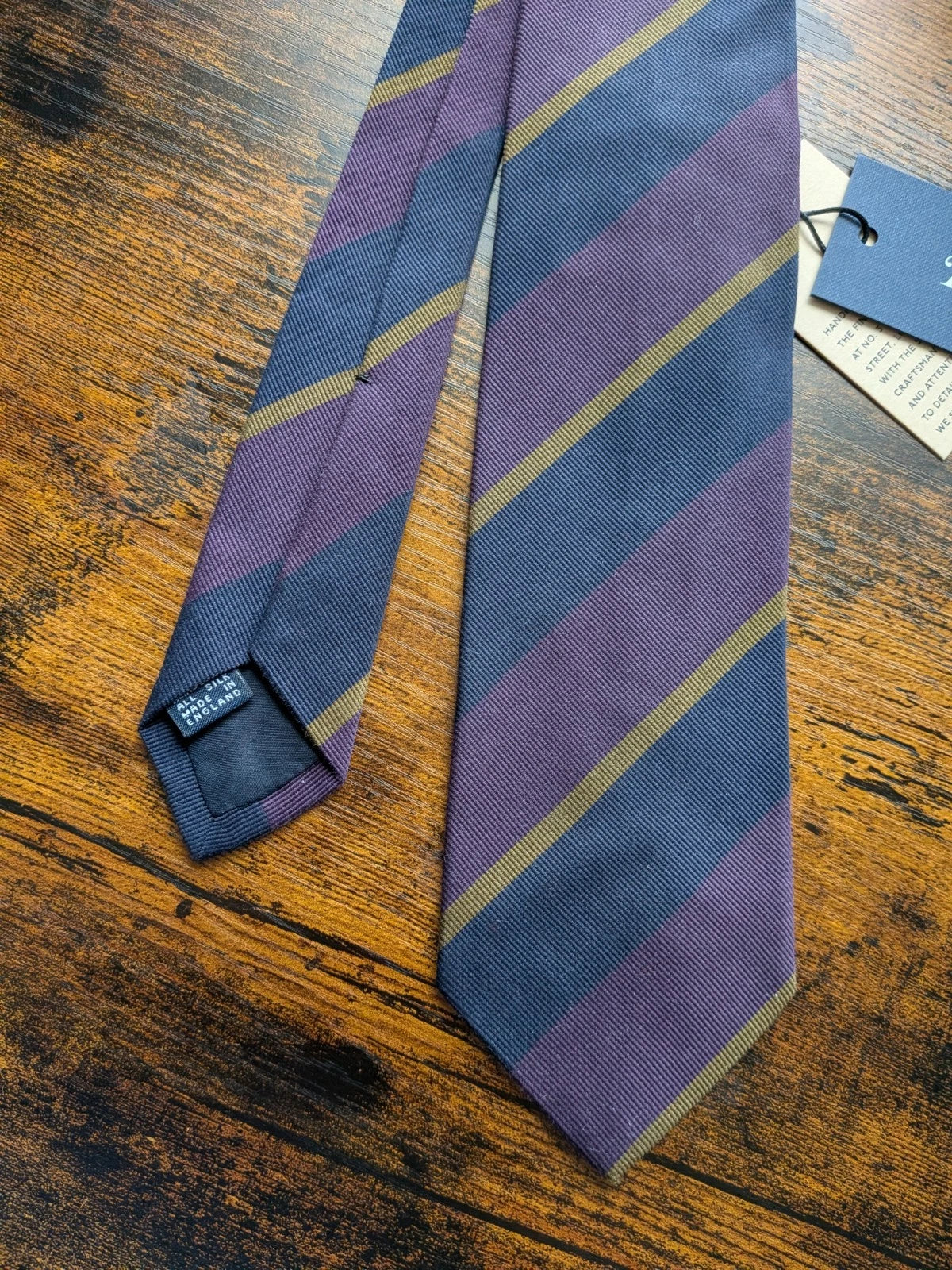 Drake's purple mastard navy handmade striped silk tie detail view 3