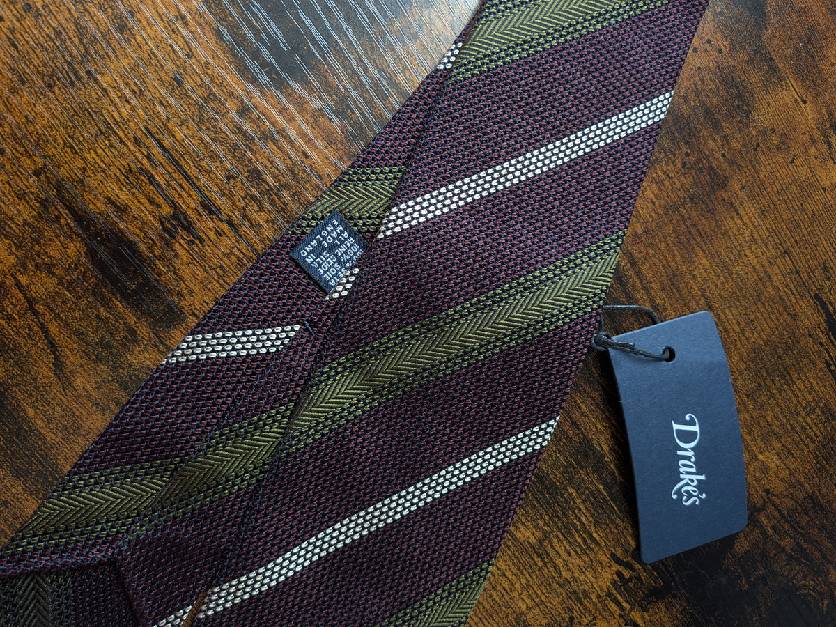Drake's purple mastard white handmade striped silk tie detail view 2