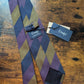 Drake's purple navy mastard handmade striped silk tie detail view 2