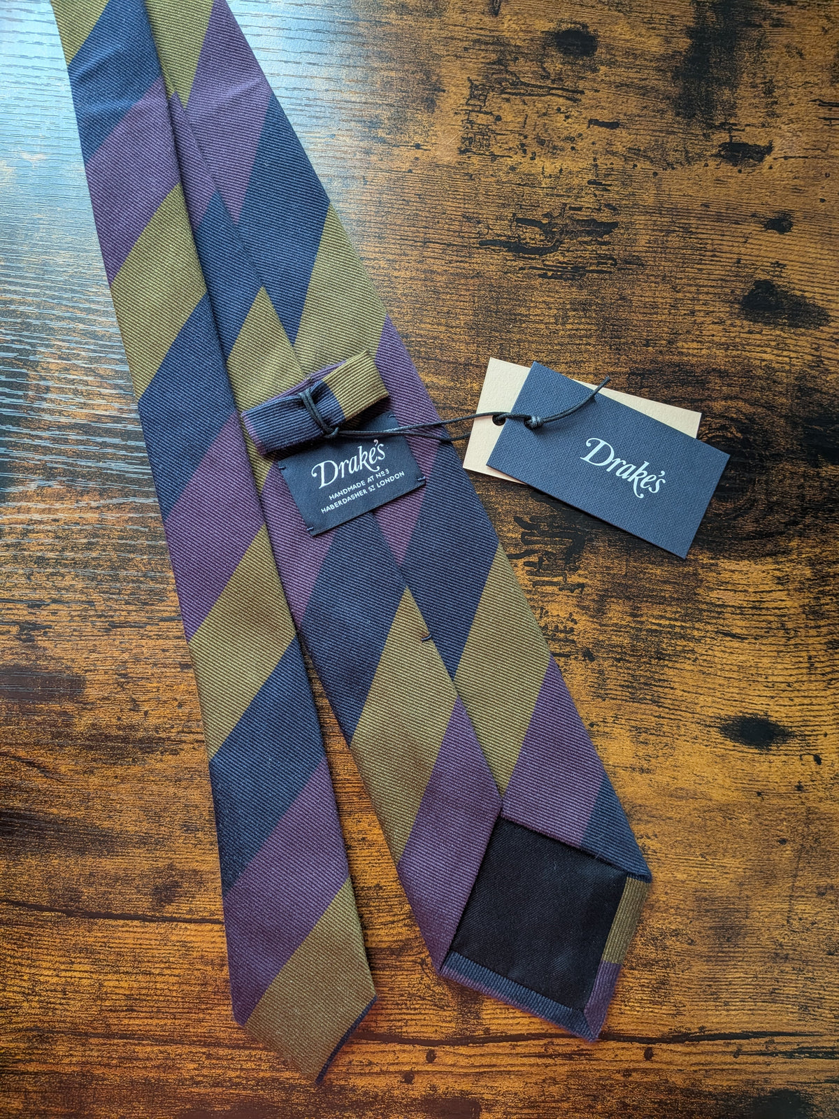 Drake's purple navy mastard handmade striped silk tie detail view 2