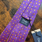 Drake's red panda motif handmade tipped silk tie detail view 4