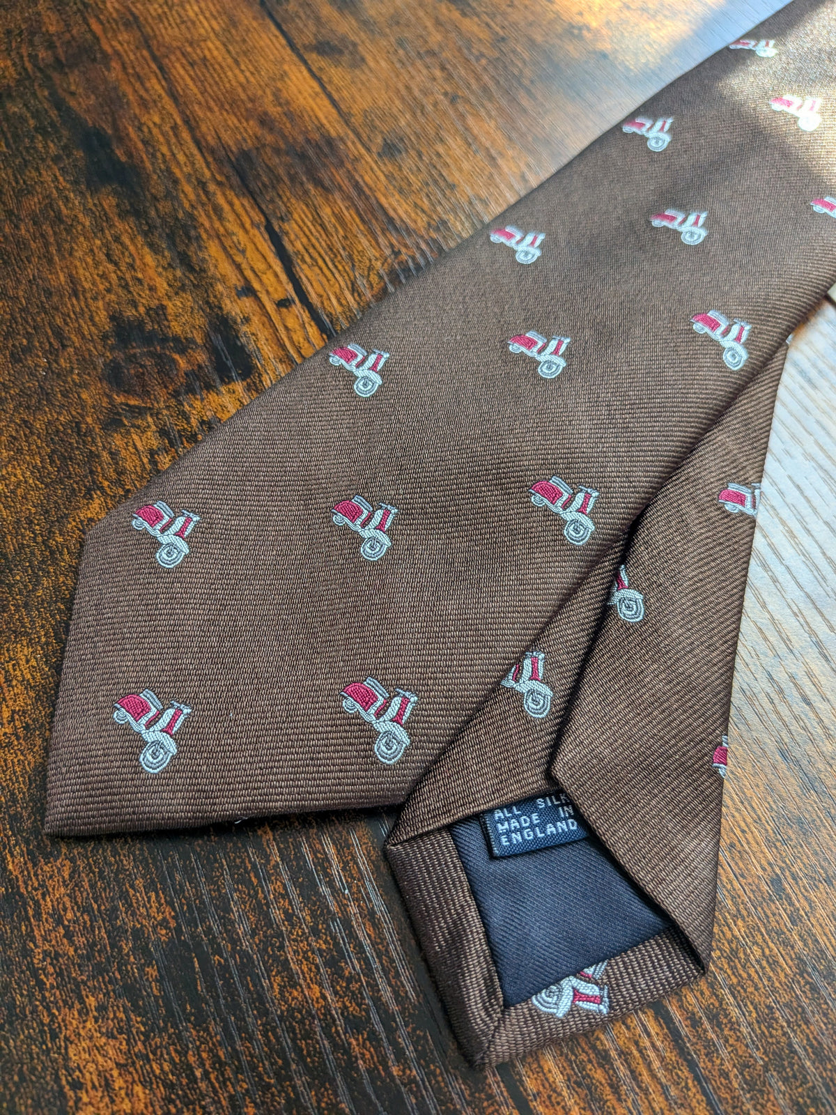 Drake's vespa motif handmade silk tie dark brown pink detail view 3