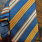 Drake's yellow navy red block striped silk tie detail view 2